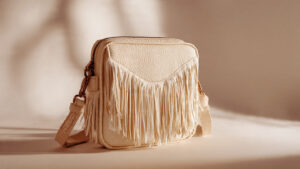 Unisex Crossbody Bag with Adjustable Strap & Fringe Detail